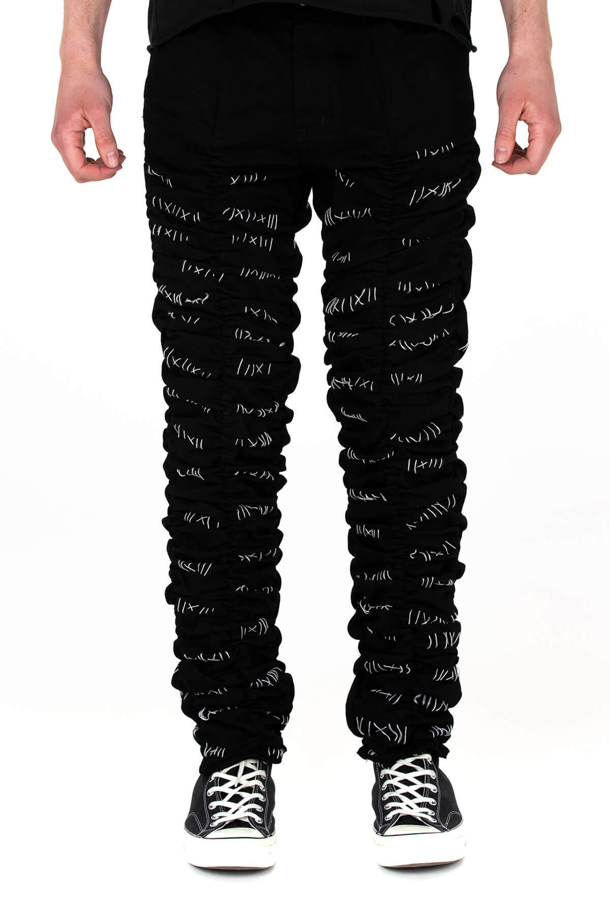 stacked black joggers